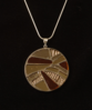 round brown pendant.png